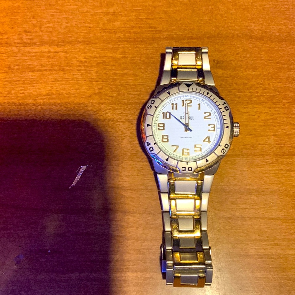 Mens jean paul watch,water proof,it was resized so it’s a little smaller